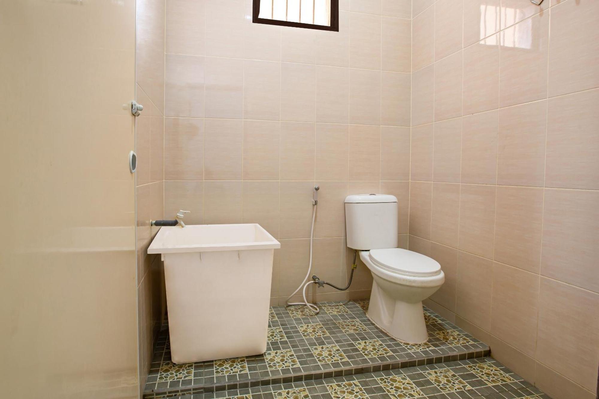 Oyo 92587 Homestay Romauli Kampung Radja Jambi Εξωτερικό φωτογραφία