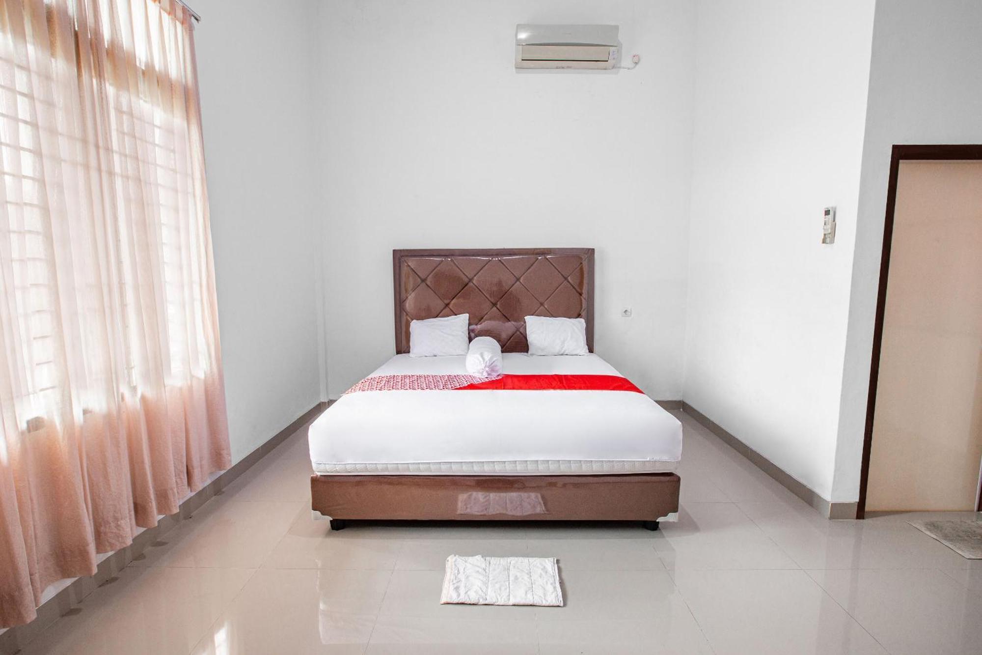 Oyo 92587 Homestay Romauli Kampung Radja Jambi Εξωτερικό φωτογραφία