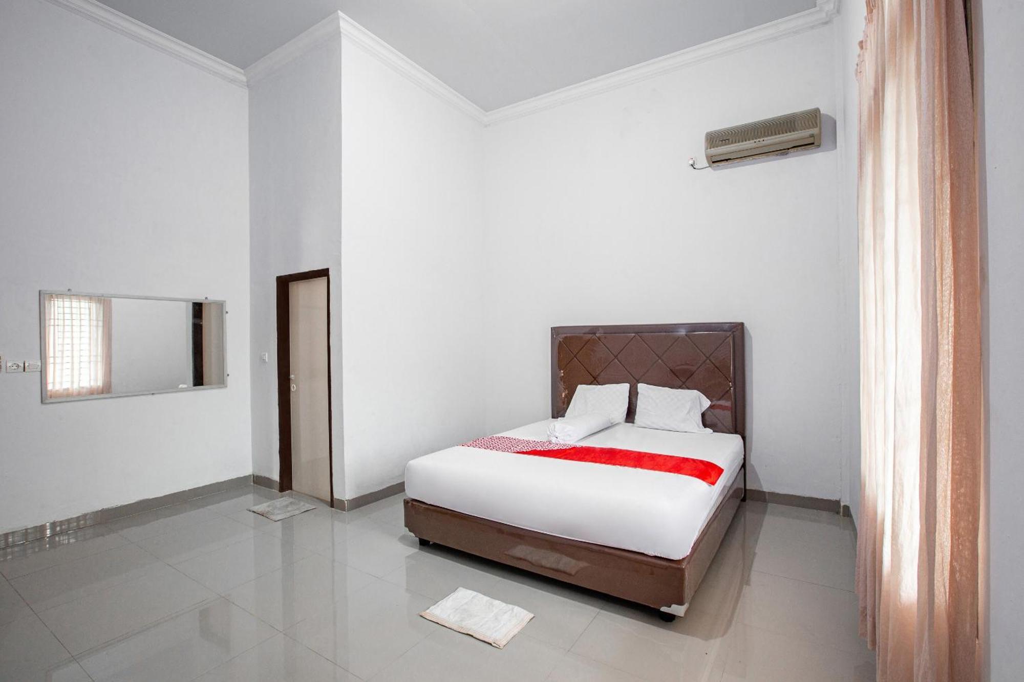 Oyo 92587 Homestay Romauli Kampung Radja Jambi Εξωτερικό φωτογραφία