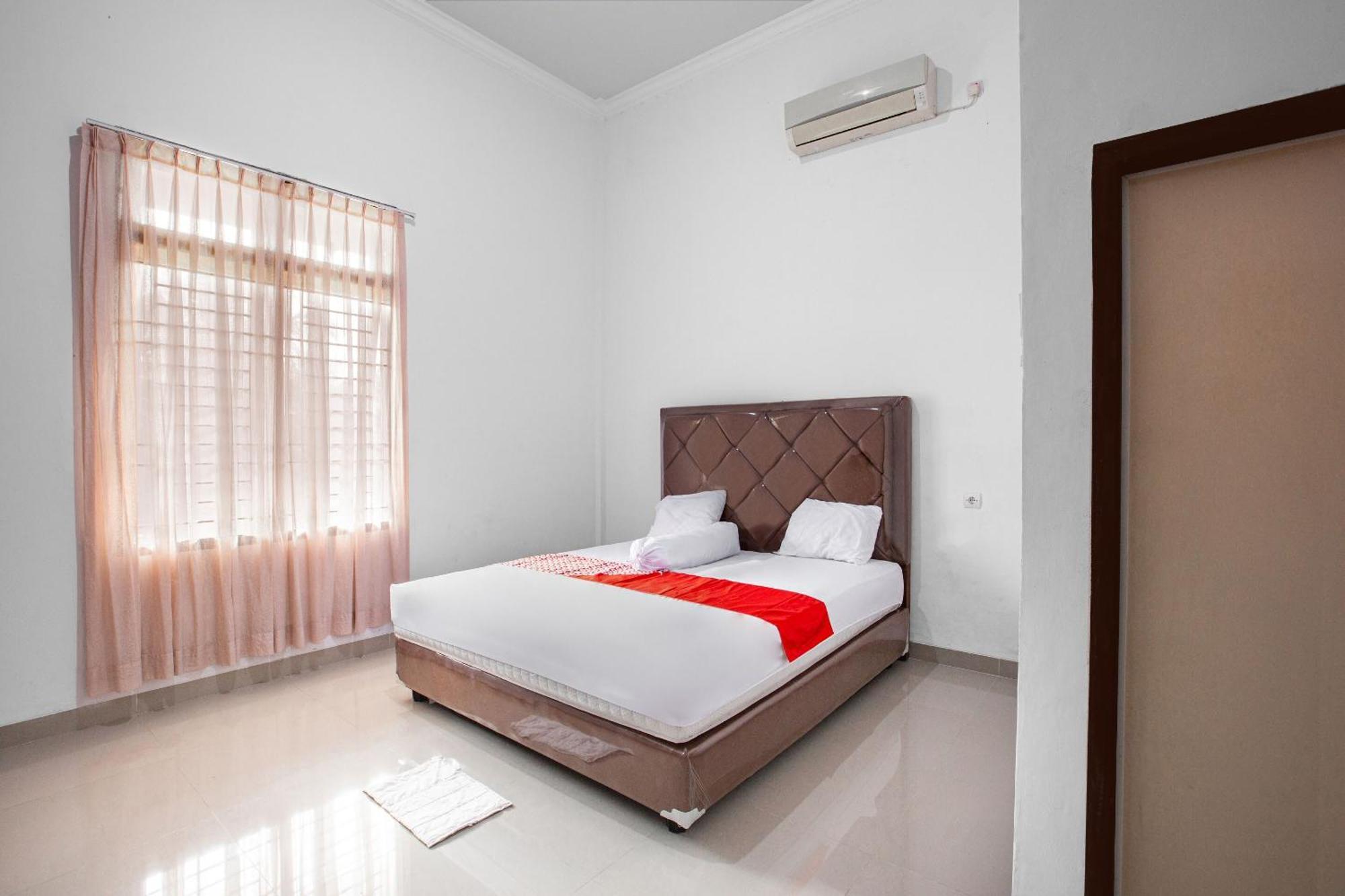 Oyo 92587 Homestay Romauli Kampung Radja Jambi Εξωτερικό φωτογραφία