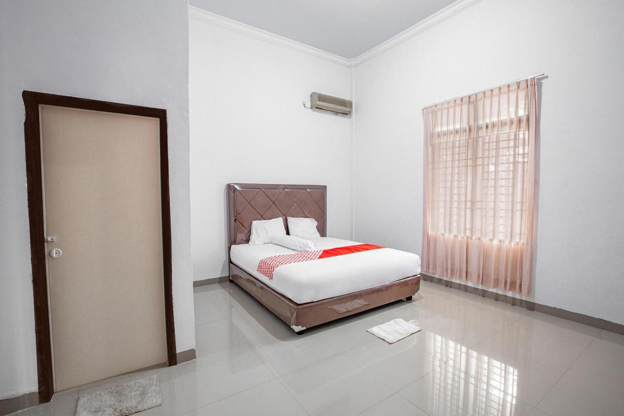 Oyo 92587 Homestay Romauli Kampung Radja Jambi Εξωτερικό φωτογραφία