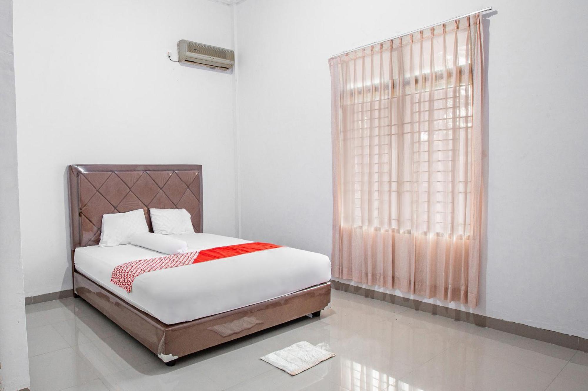 Oyo 92587 Homestay Romauli Kampung Radja Jambi Εξωτερικό φωτογραφία