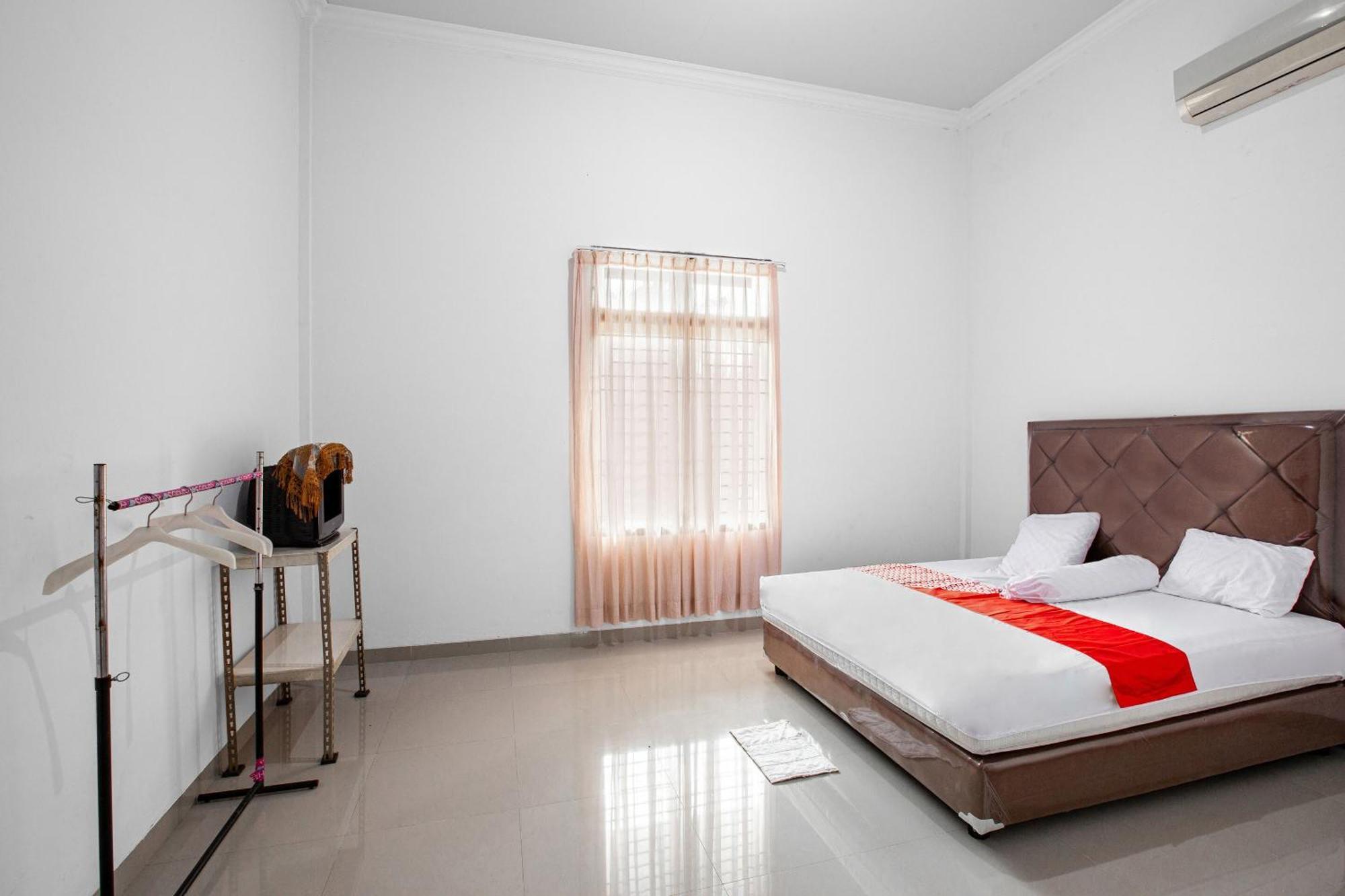 Oyo 92587 Homestay Romauli Kampung Radja Jambi Εξωτερικό φωτογραφία